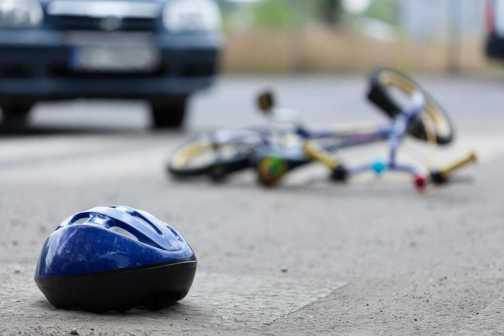 Bicycle rider struck by a car