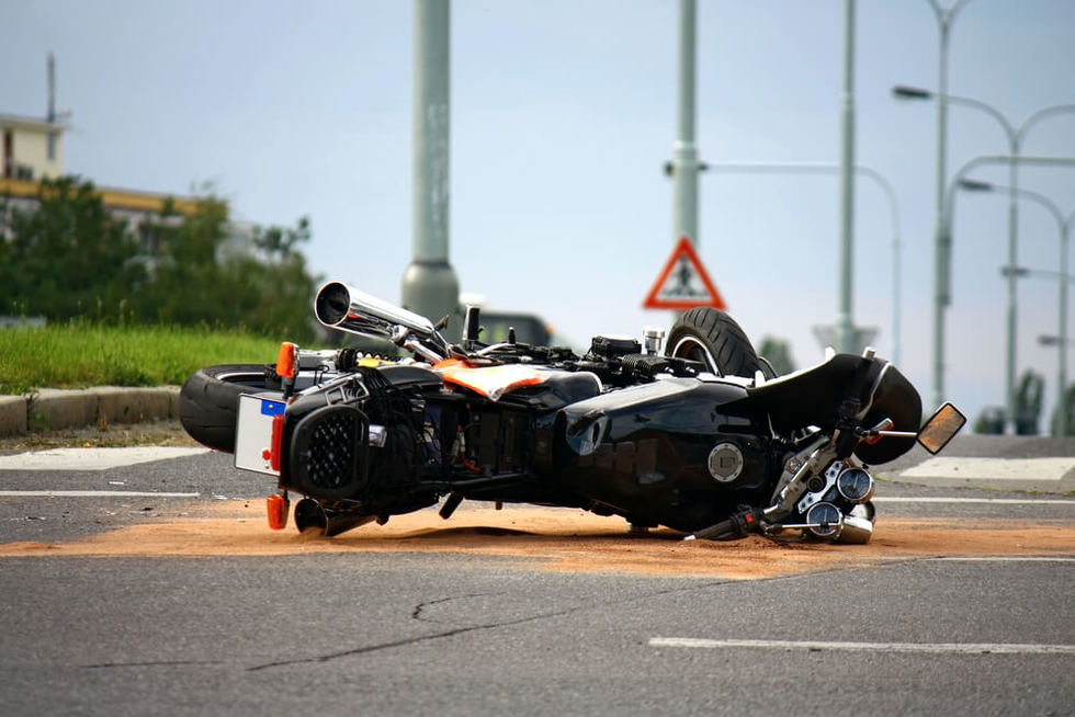Man hit by a car on his motorcycle