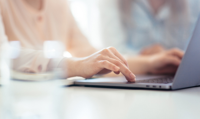 Woman by computer